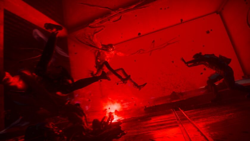 Control Resonant screenshot: Dylan Faden faces a paranatural entity in a red-lit corridor